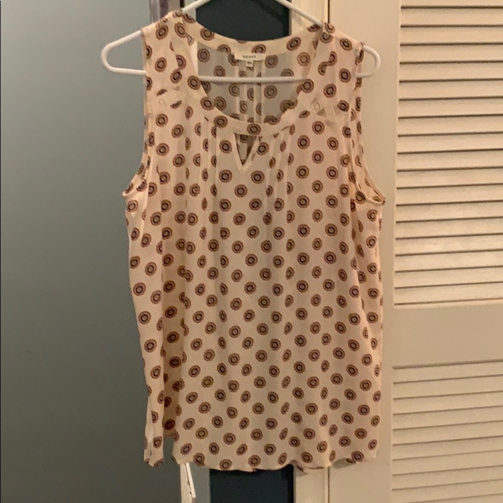 Pleione, Sleeveless blouse